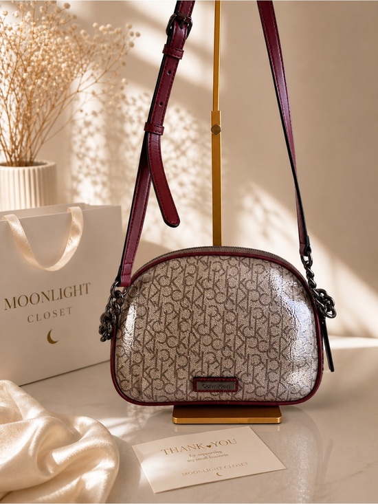 Calvin Klein Handbags - Calvin Klein Cream Monogram Crossbody with Red Trim